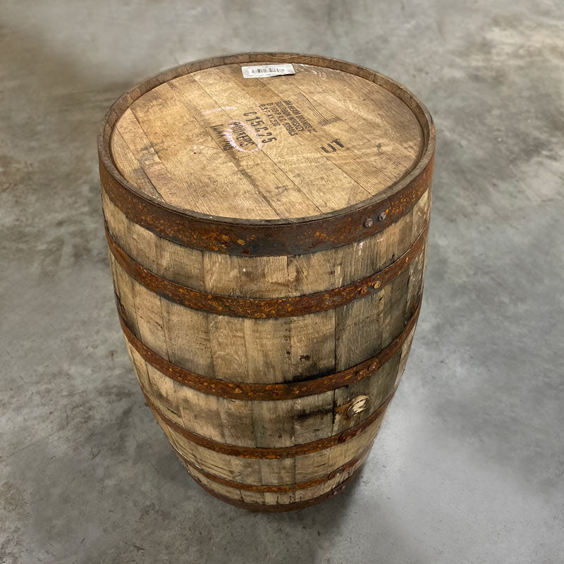 Head and side of a Booker's Bourbon barrel with Jim Beam Brands, distillery info and age statement stamped on the head