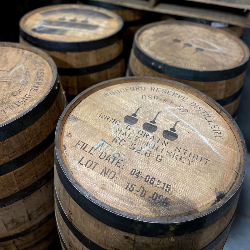 Woodford Reserve Kentucky Straight Malt Whiskey barrels with distillery markings and three pot still stamps on heads
