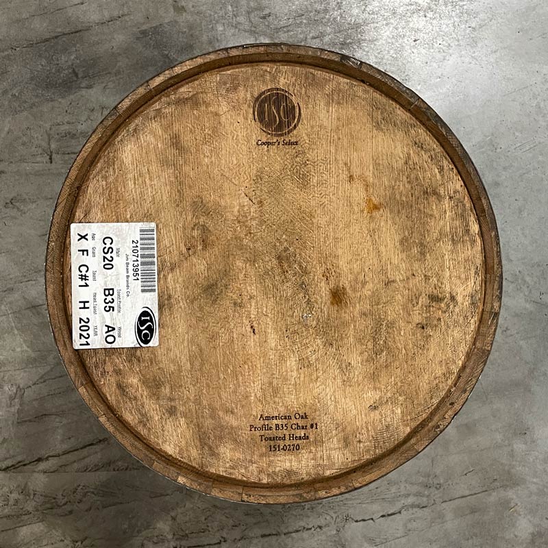 Looking down at the head of a toasted oak bourbon barrel from a Jim Beam owned brand