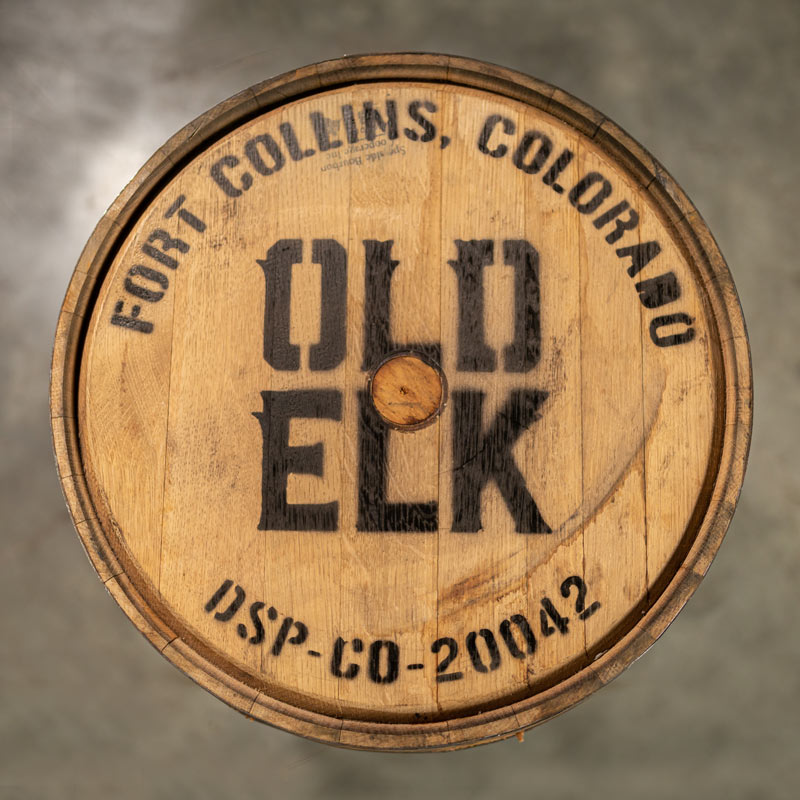 Head of an Old Elk Bourbon Barrel with a head bung and Old Elk Fort Collins Colorado DSP-CO-20042 stamped on the head