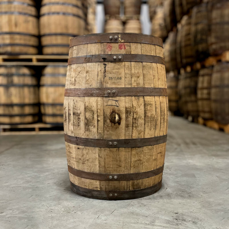 Side of a Willett Family Estate Bourbon barrel with fill date stamped on side