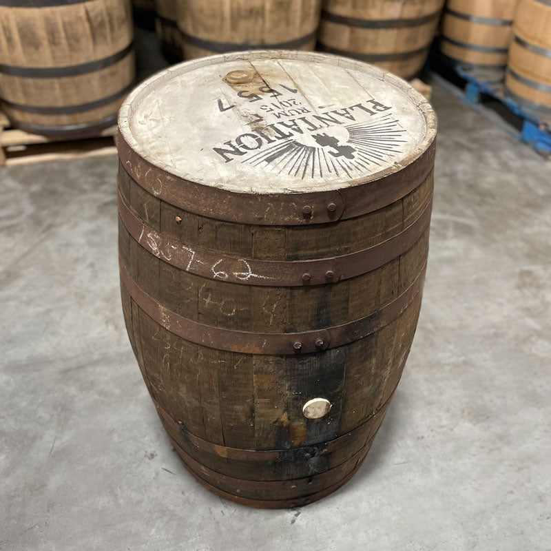 Head and side of a Bardstown Bourbon Plantation Rum Cask Finish Barrel with Plantation Rum 2015 and number 1557 stamped on head and head bung