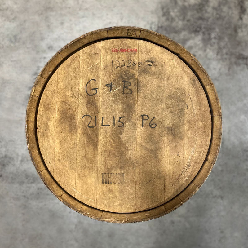 Head of a Bardstown Bourbon Plantation Rum Cask Finish Barrel with handwritten numbers and lettering on the head