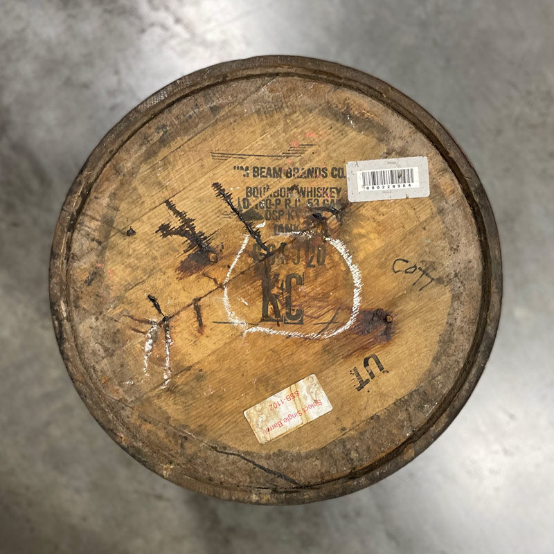 Head of an 18 Year Knob Creek Limited Edition Bourbon Barrel with Jim Beam distillery stamp and KC initials on the head