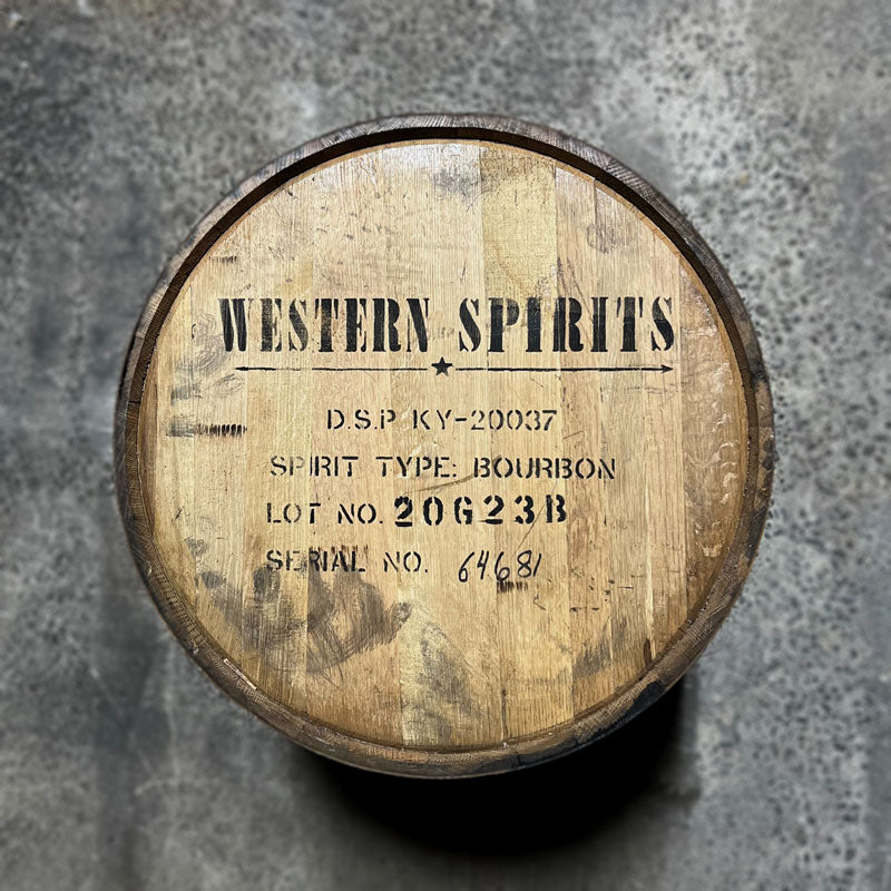 Head of a Western Spirits Bourbon barrel with DSP number, spirit type and fill date stamped on the head