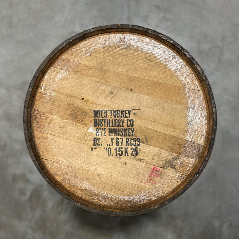 Head of a Wild Turkey Rye Whiskey Barrel with distillery information stamped on the head