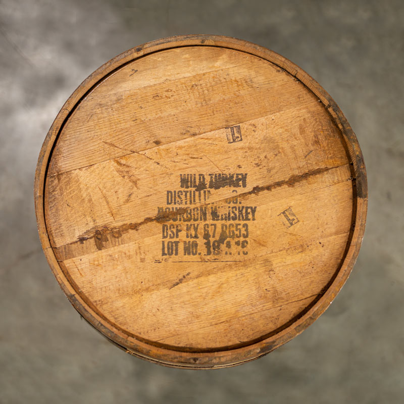 Head of a used 4 year Wild Turkey Bourbon barrel with distillery information stamped on the head