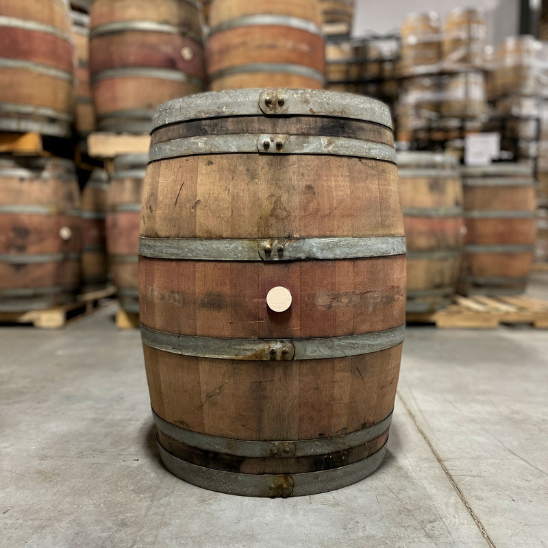 Side of a tawny port barrel with bung