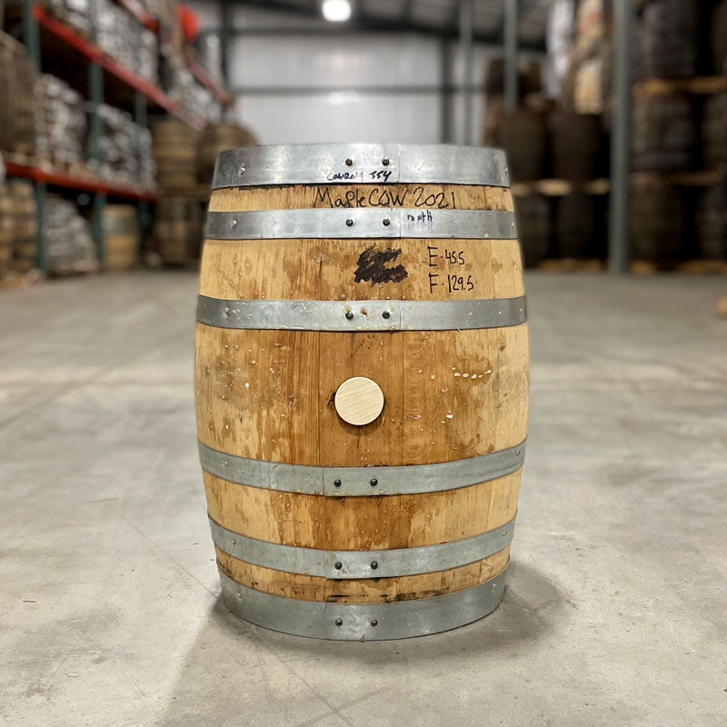 Side of a 10 Gallon Distillery 291 Maple Whiskey Barrel with writing on the side