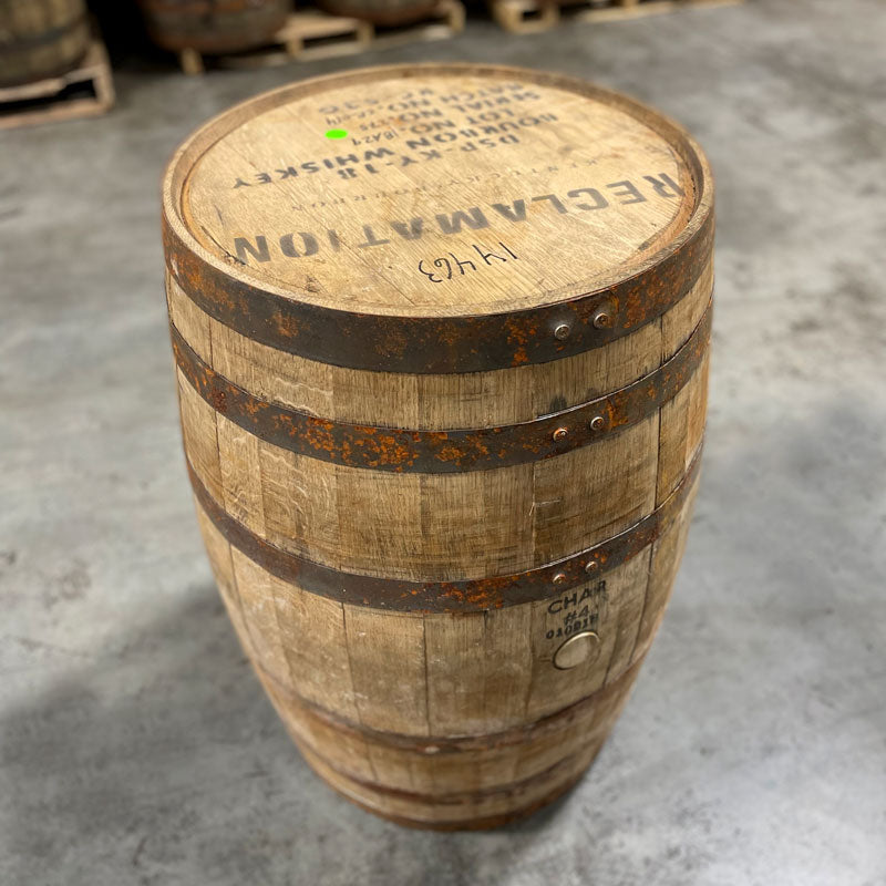Side and head of a Castle & Key Bourbon barrel with distillery information stamped on the head