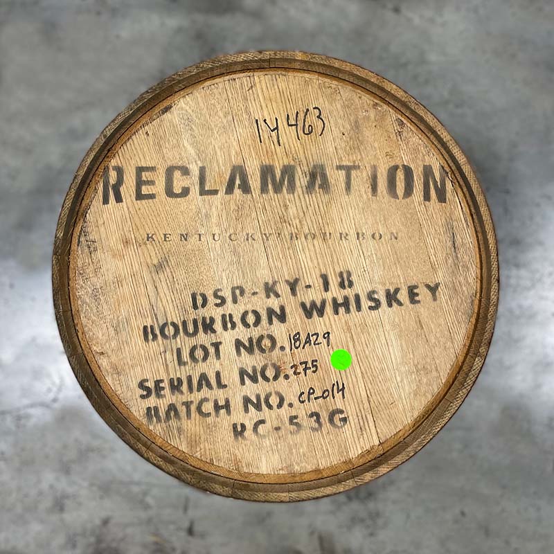 Castle & Key Bourbon barrel with distillery information and age statement stamped on the head
