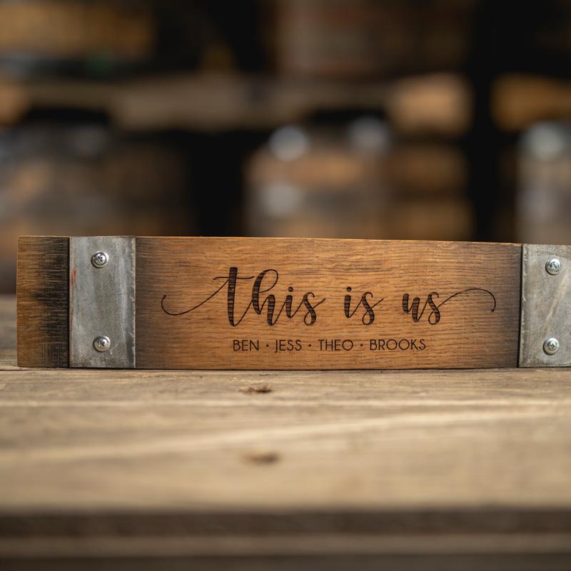 Engraved barrel stave with text This is us and family member names
