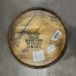 
                  
                    Head of a Russell's Reserve Bourbon Single Barrel with distillery markings, information and a "Private Barrel Selection" sticker 
                  
                