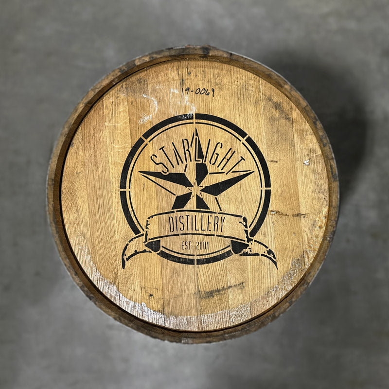 Head of a Starlight Distillery Bourbon Barrel with Starlight Distillery star logo and Est. 2001 stamped on the head