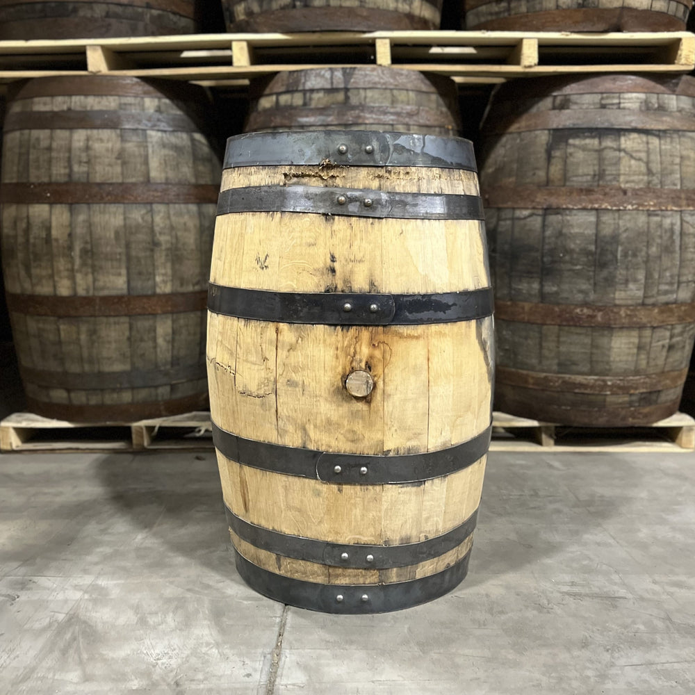 
                  
                    Bunghole side of a 25 Gallon Furniture Grade Whiskey Barrel with other used barrels for sale in the background
                  
                