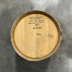 
                  
                    Head of a 15 Gallon Kings County Peated Bourbon Barrel with fill notes handwritten on the head
                  
                