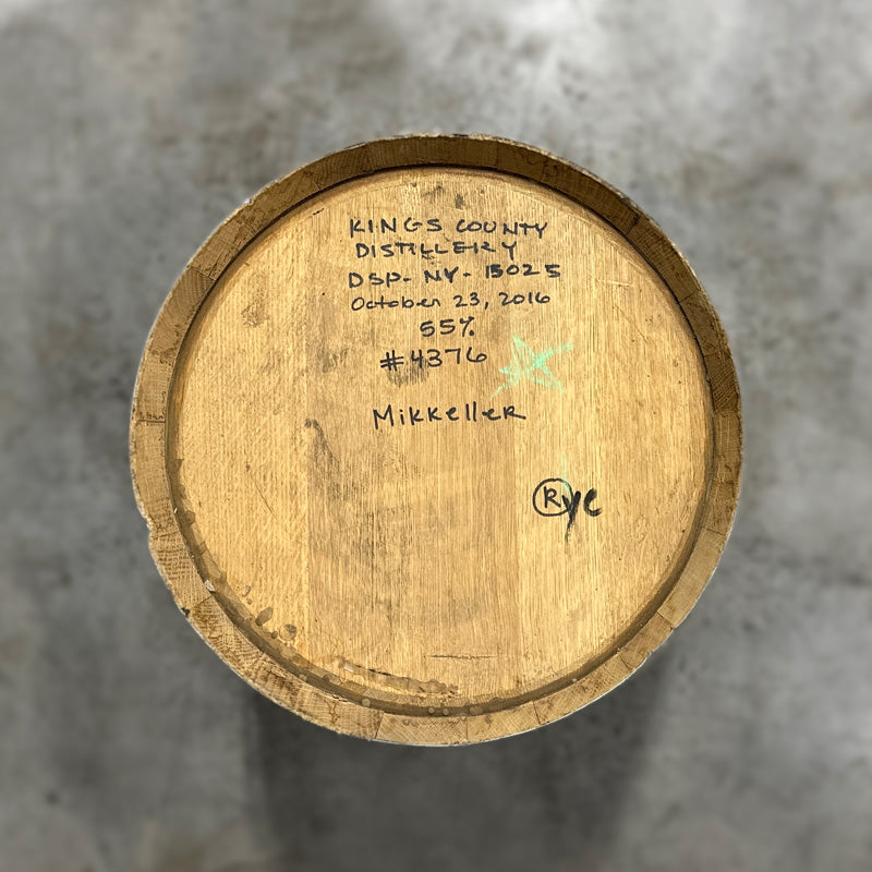 
                  
                    Head of a 15 Gallon Kings County Rye Whiskey Barrel with handwritten fill notes on the head
                  
                