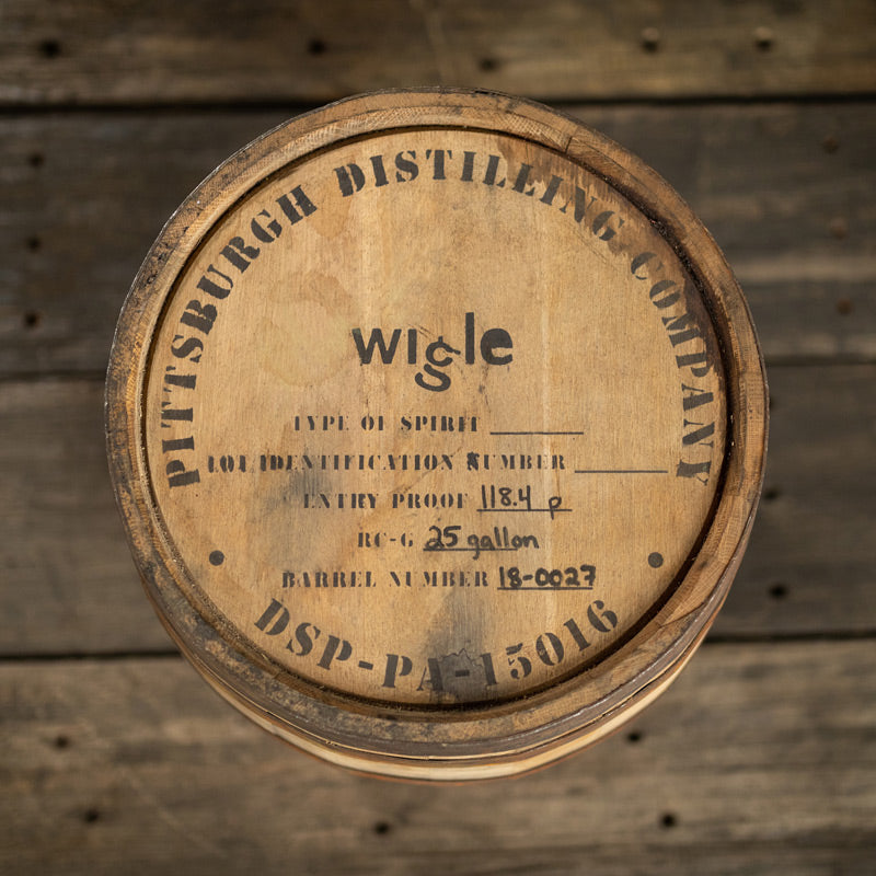 Head of a 25 Gallon Wigle Pommeau Barrel with distillery information stamped on the head