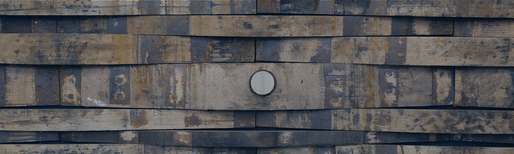 Barrel stave decor wall with bunghole stave and bung in middle