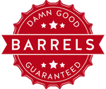 Logo shaped like bottle cap and banner with text Damn Good Barrels Guaranteed and three stars above and below banner