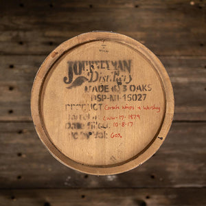 
                  
                    Head of a 15 Gallon Journeyman Whiskey barrel with distillery information, fill date and distillate info on the head
                  
                