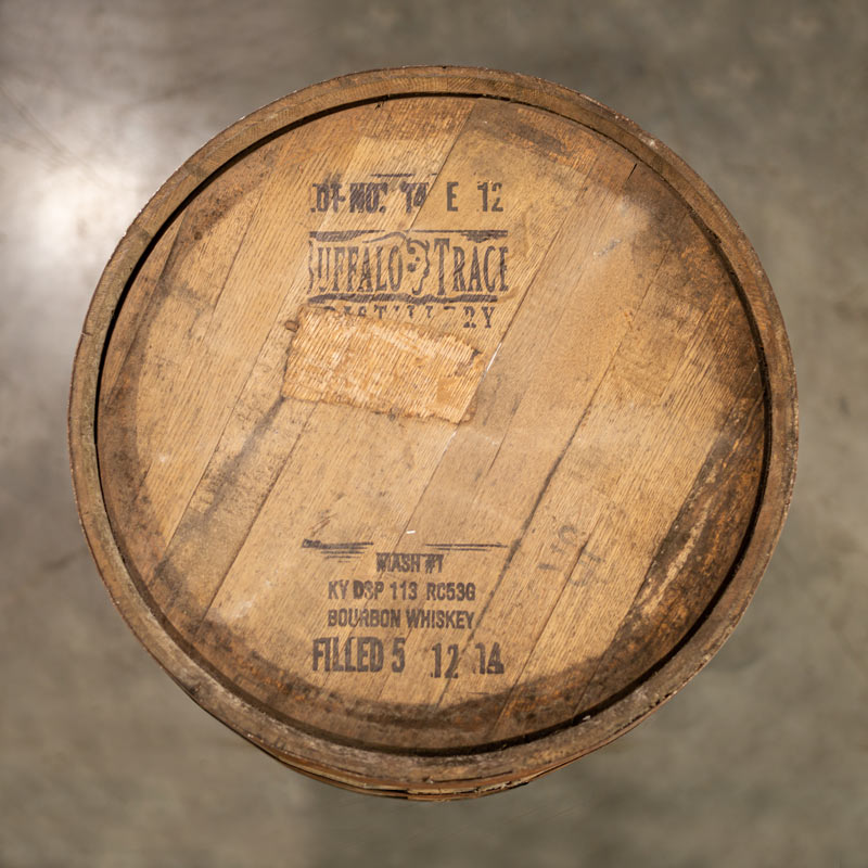 
                  
                    Head of a Buffalo Trace Mash 1 Bourbon Barrel with distillery information and buffalo logo stamped on the head
                  
                