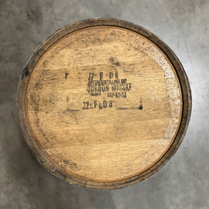 
                  
                    Head of a Barton Distilling Co. Bourbon Whiskey Barrel with a 2007 fill date and other head markings
                  
                