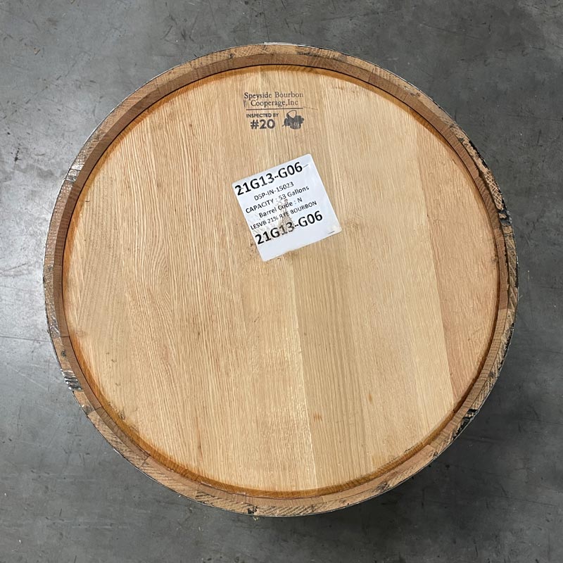 View of head of a Next Century Spirits Young Bourbon Barrel with cooperage label and sticker