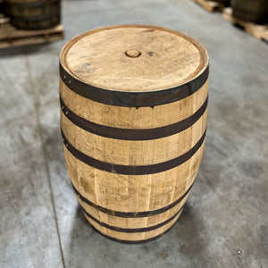 
                  
                    Head and side of a Penelope Bourbon Barrel with a head bung
                  
                