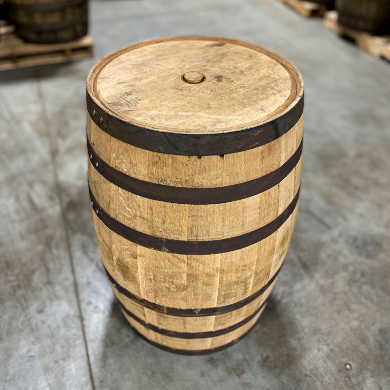 
                  
                    Head and side of a Penelope Wheated Bourbon Barrel with a head bung
                  
                