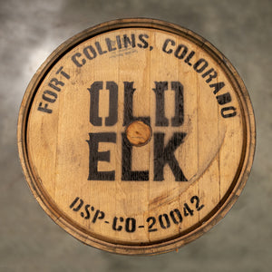 
                  
                    Head of an Old Elk Bourbon Barrel with a head bung and Old Elk Fort Collins Colorado DSP-CO-20042 stamped on the head
                  
                