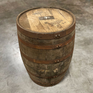 
                  
                    Head and side of a 10 Year Buffalo Trace Mash 1 Bourbon Barrel with buffalo logo, distillery markings and age statement stamp on the head
                  
                