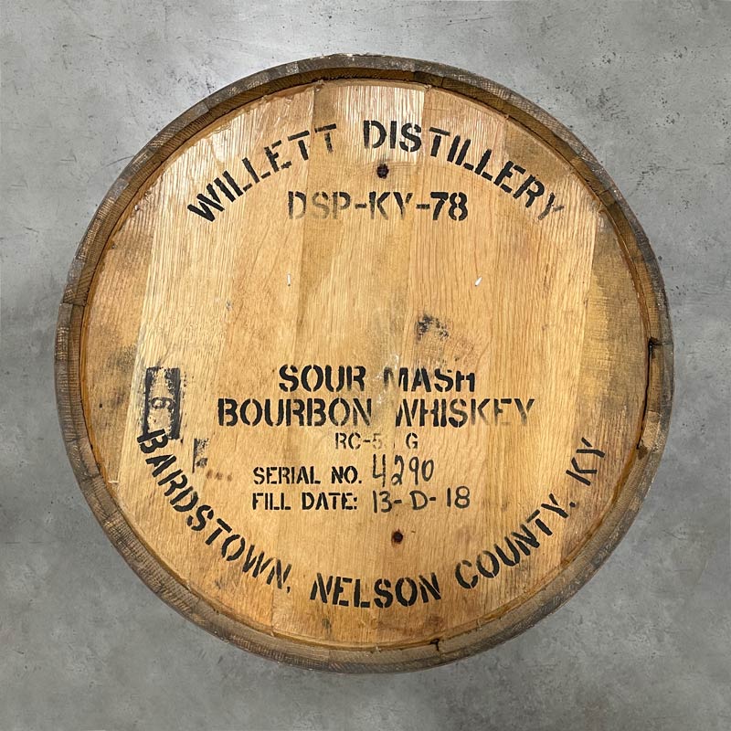 Head of a Willett Family Estate Bourbon Barrel with distillery stamps and markings