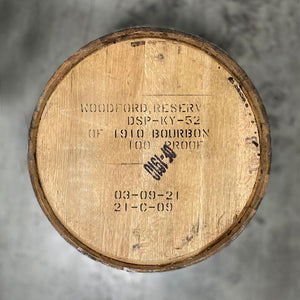 
                  
                    Head of an Old Forester 1910 Bourbon Whisky Barrel with Woodford Reserve distillery name, information, fill dates and OF-1910 stamped on the head
                  
                