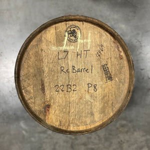 
                  
                    Head of a Lucky Seven Bourbon Holiday Toast Barrel with Kelvin Cooperage stamp and L7 HT ReBarrel and fill date handwritten on head.
                  
                