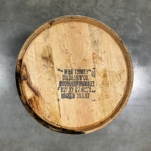 
                  
                    Head of a 2-Year Wild Turkey Bourbon Barrel with distillery information and fill date stamped on the head
                  
                