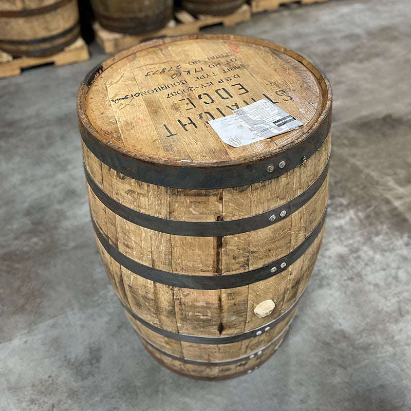 Head and side of a Straight Edge Bourbon barrel with distillery name, fill date and info stamped on the side