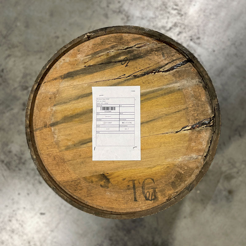 Head of a 15 Year Widow Jane Bourbon Barrel with a paper info sheet stapled to the head