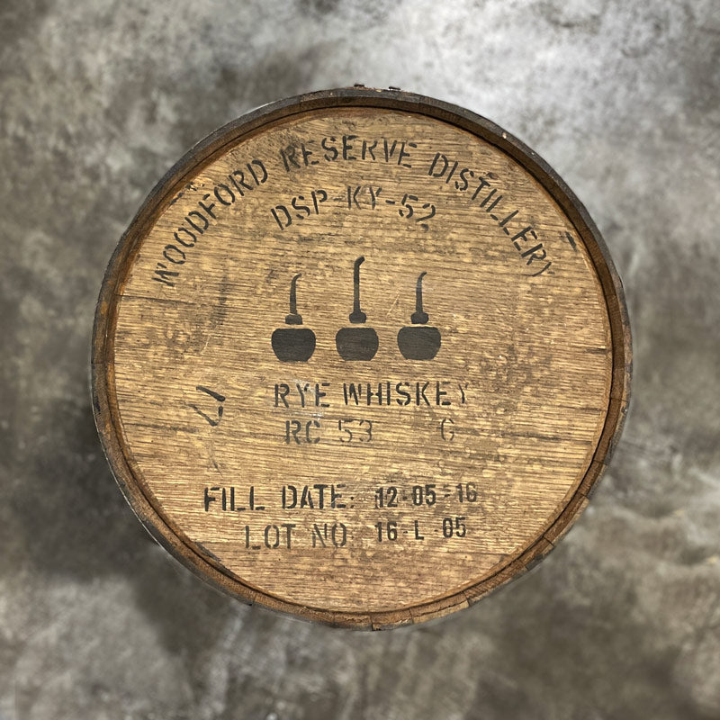 Head of a Woodford Reserve Rye Whiskey Barrel with Woodford Reserve Distillery DSP-KY-52 and 3 stills and other information stamped on the head