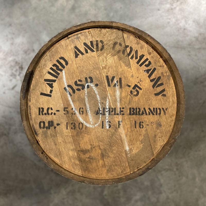 Head of a Laird's apple brandy barrel with distillery information stamped on the head