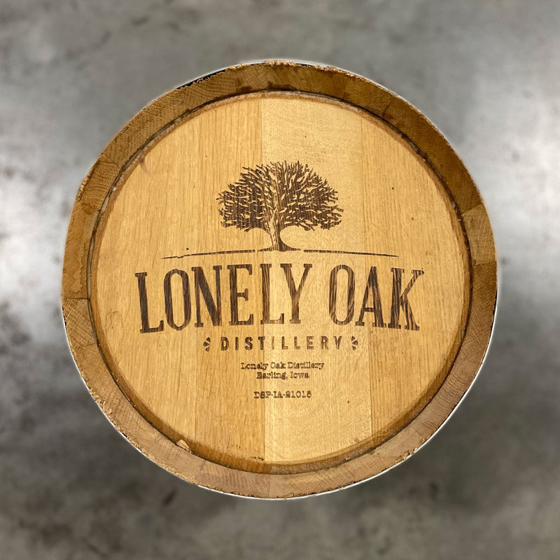 Head of a 5 Gallon Lonely Oak Bourbon Barrel with tree and Lonely Oak Distillery Earling, Iowa engraved on the head