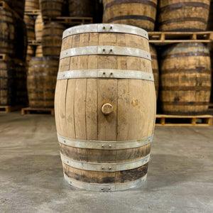 
                  
                    Side of a 15 Gallon Lonely Oak Rum Barrel Ex-Bourbon with other used barrels on pallets in the background
                  
                