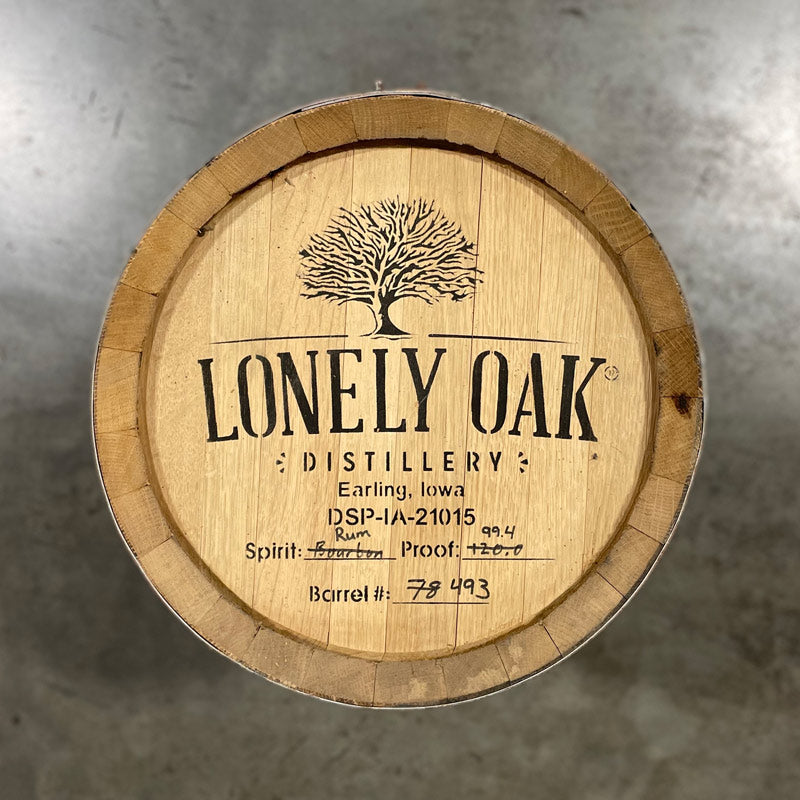 Head of a 15 Gallon Lonely Oak Rum Barrel Ex-Bourbon with tree and Lonely Oak Distillery logo and distillery information stamped on the head