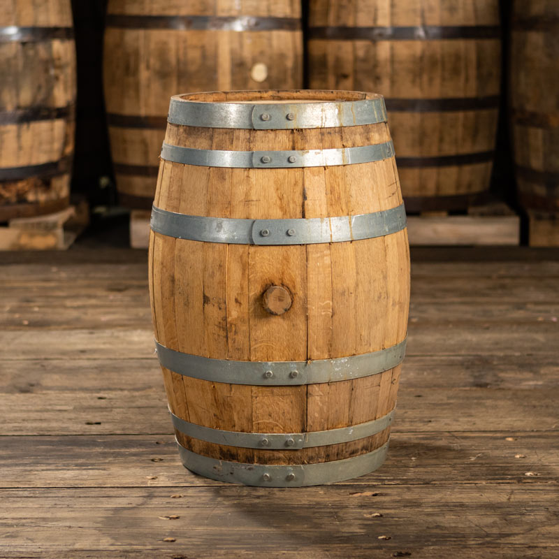 
                  
                    13 Gallon John Emerald Distilling Whiskey barrel with steel rings and light colored staves
                  
                