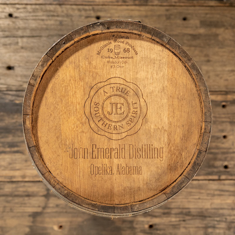 View from above of head of 13 Gallon John Emerald Distilling Whiskey barrel with stamp logo with text JE A True Souther Spirit John Emerald Distilling Opelika, Alabama