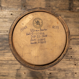 
                  
                    View from above of head of 25 Gallon FEW Spirits 4 Grain Bourbon barrel with Kelvin Cooperage logo and distiller writing on head
                  
                