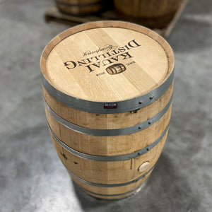 
                  
                    View of head and side of a 30 Gallon Kauai Distilling Co. Bourbon Barrel with Kauai Distilling Company, a barrel image and est 2014 stamped on the head
                  
                