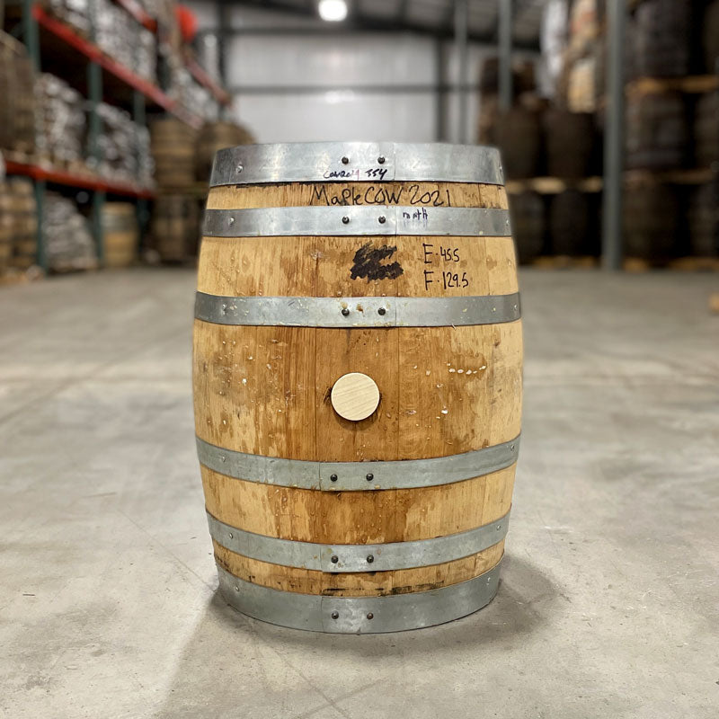 
                  
                    Side of a 10 Gallon Distillery 291 Maple Whiskey Barrel with writing on the side
                  
                