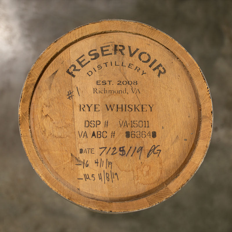 Head of a used 10 Gallon Reservoir Distillery Rye Whiskey barrel with distillery name and information stamped on the head