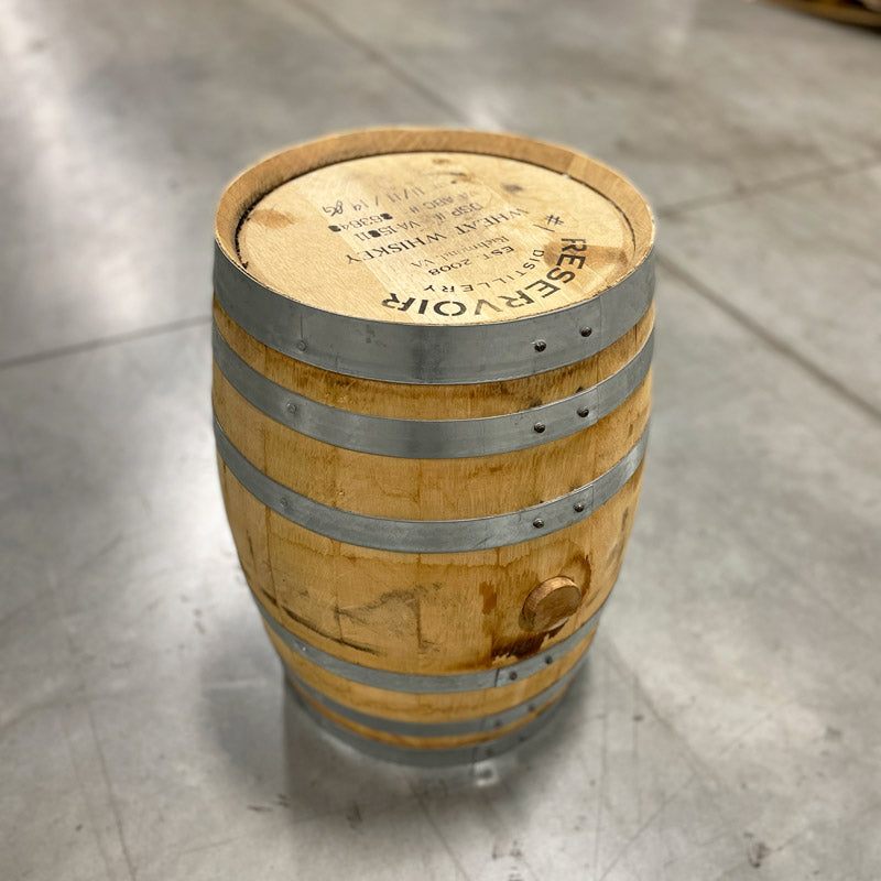 Side and head of a 10 Gallon Reservoir Distillery Wheat Whiskey barrel with distillery markings and information on the head